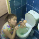 An attractive Eastern-European girl abuses her plastic doll by placing it in the toilet and taking a shit on top of it. See movies 6213, 6412, 8098 and 9008 for more. Over 7 minutes.
